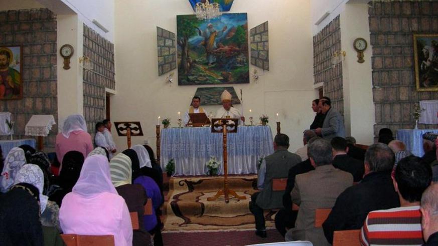 Christians go to the Mass for the feast of St. Levo in the Chaldean village of Levo, Iraq. Photo by Sandrine Alexie