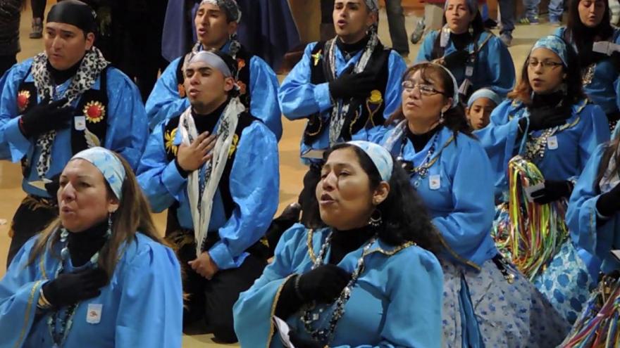 Dance groups called bailes sing and pray to the Virgen del Carmen in La Tirana, Chile.