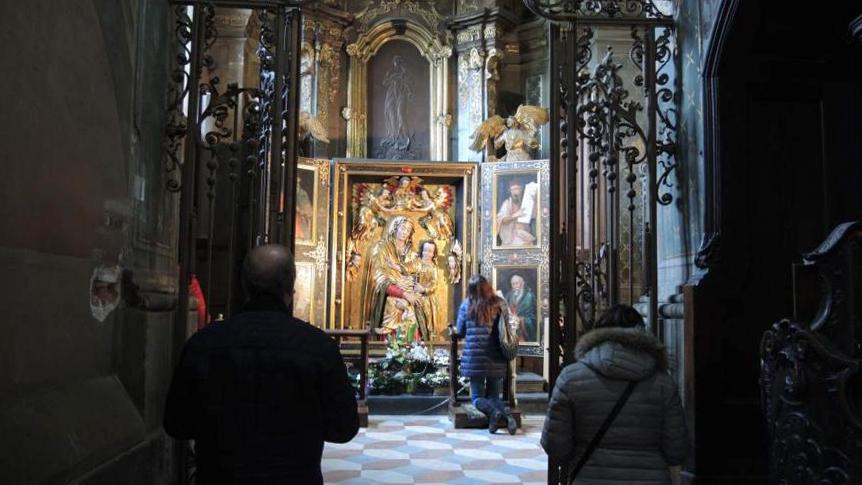 Praying in the side chapel of St. Peter and Paul Garrison church.