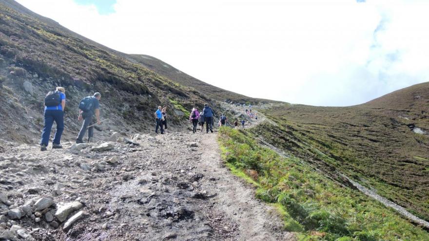 As many as 25,000 people hike the rocky slopes of Croagh Patrick, a mountain associated with St. Patrick, on Ireland's Reek Sunday.