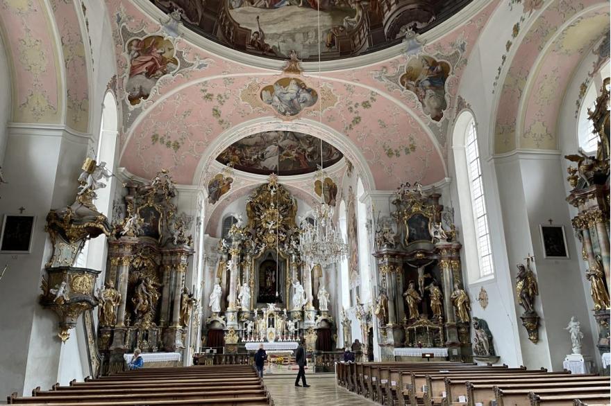 Interior of the church of St. Peter and Paul, in a baroque style typical of the region.