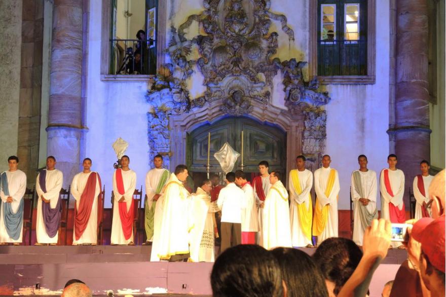 The washing of the feet on Holy Thursday features young men from town, on a stage in front of St. Francis of Assisi Church.