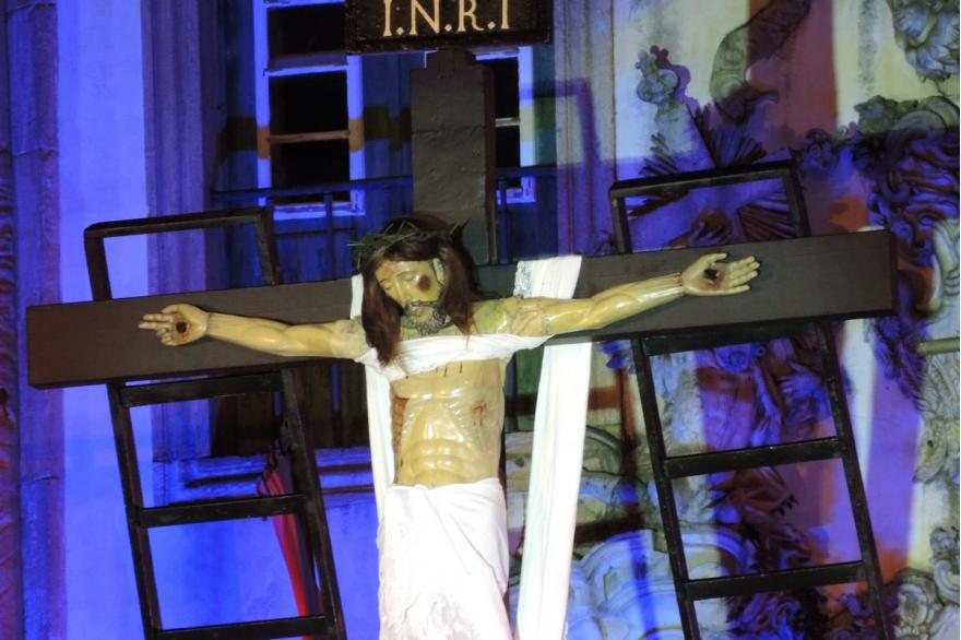 The crucifixion is re-enacted outside St. Francis Church.