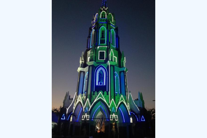 The main tower of Our Lady of Good Health, Bengaluru. As is true at many shrines and churches, dark hours - early morning and evening, before and after work, are the busiest times.