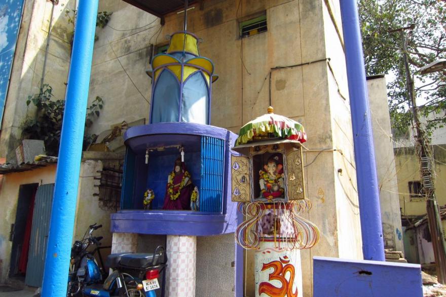 In a back alley of Bengaluru, shrines of Christian saints and the Hindu deity Ganesh share the same property.