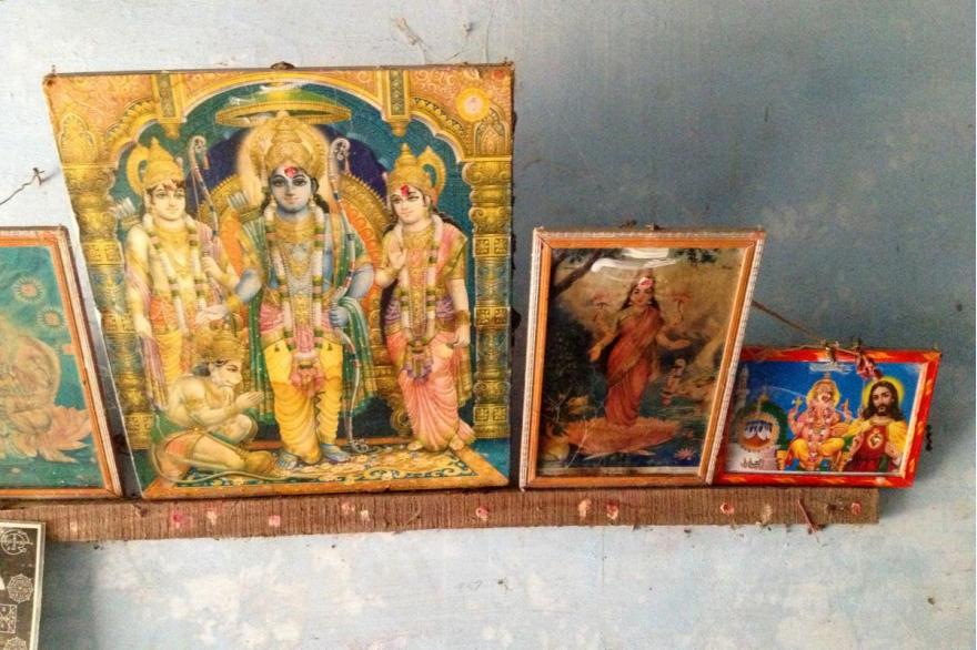A small business in Tamil Nadu has a range of Hindu Religious images on display. To the right, an image includes a trio of Muslim, Hindu and Catholic images.