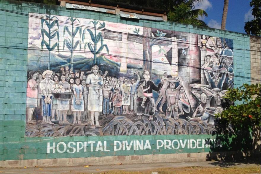 Mural outside the Divina Providencia Hospital, a hospice where Archbishop Oscar Romero worked and was assassinated in 1980. San Salvador, El Salvador.
