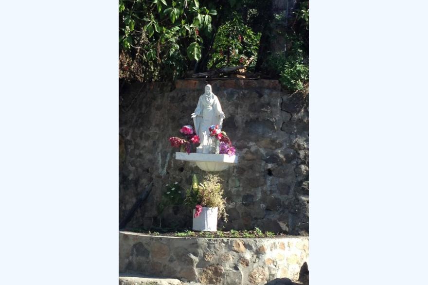 A shrine at an intersection in Suchitoto, El Salvador.