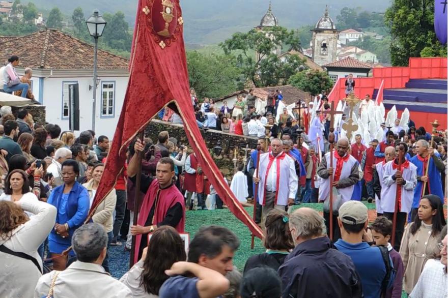 Members of confraternities dress in a variety of robes to lead the Easter procession.