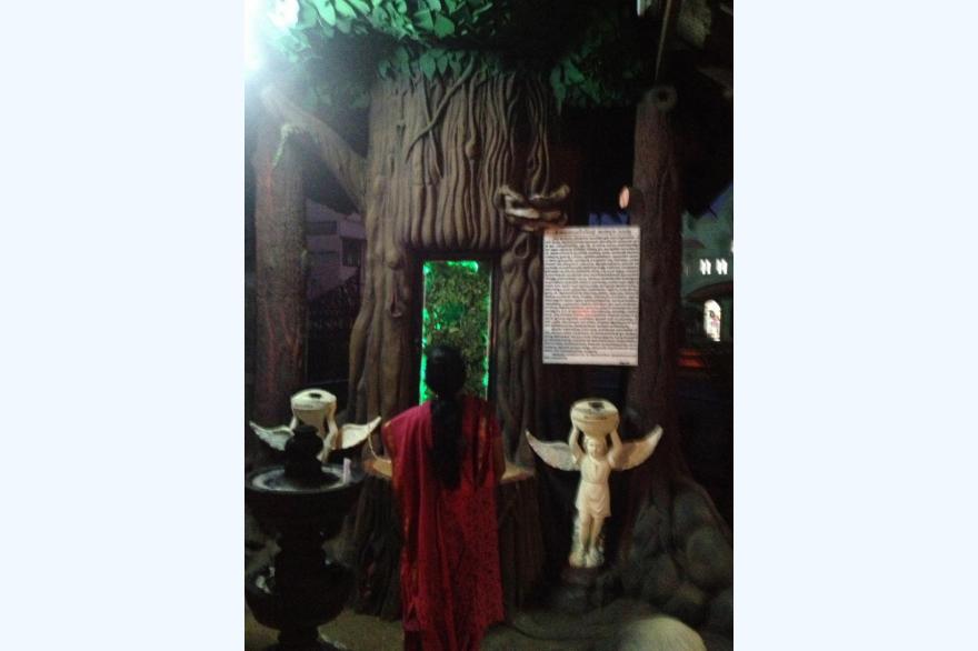Devotee at the shrine of St. Anthony at Pulluvazhy, Kerala