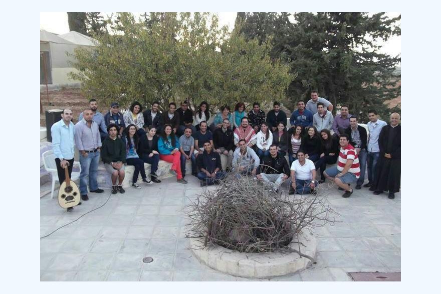 A youth group drawing members from the Catholic churches throughout Amman gathers weekly for meals and fellowship.