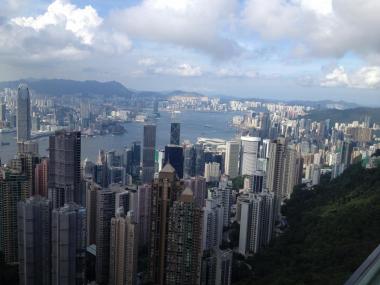 Hong Kong from Victoria peak, past Central district and across the harbor looking East.