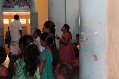 Pilgrims pray before Our Lady of Madhu.