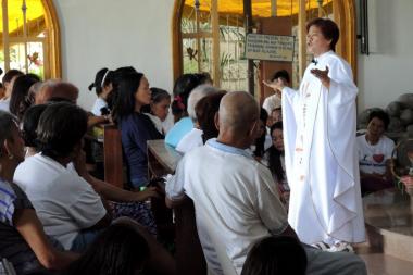 Apo Conching preaches and practices faith healing through the Divine Mercy at a church of the same name, Pampanga, Philippines.