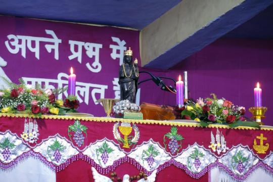 The statue of Dhori Mata, Miraculous Mother of the Coalmines, on the altar.