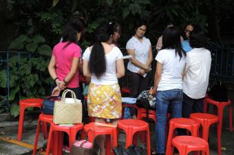 Prayer group outside St. Joseph's Church, Hong Kong