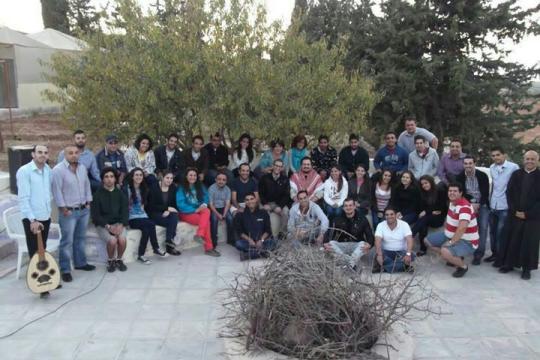 A youth group drawing members from the Catholic churches throughout Amman gathers weekly for meals and fellowship.
