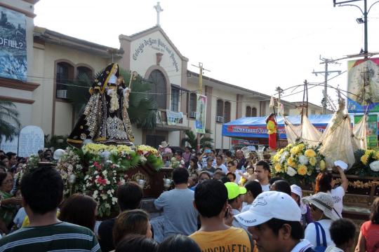 Santa Clara, patroness of the second day of the feast, is brought out of the church and placed at the center on the day of her feast.